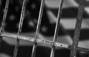 american-flag-behind-bars-466